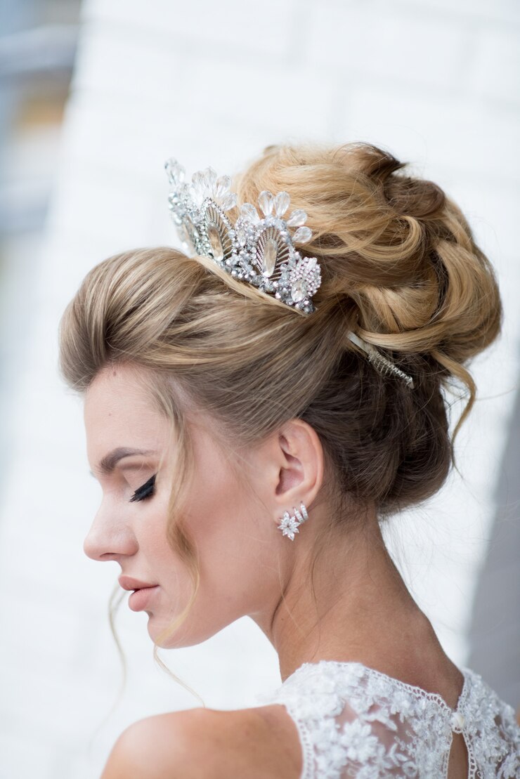 beautiful-blonde-bride-with-high-hair-precious-silver-wreath-her-hair_8353-7270